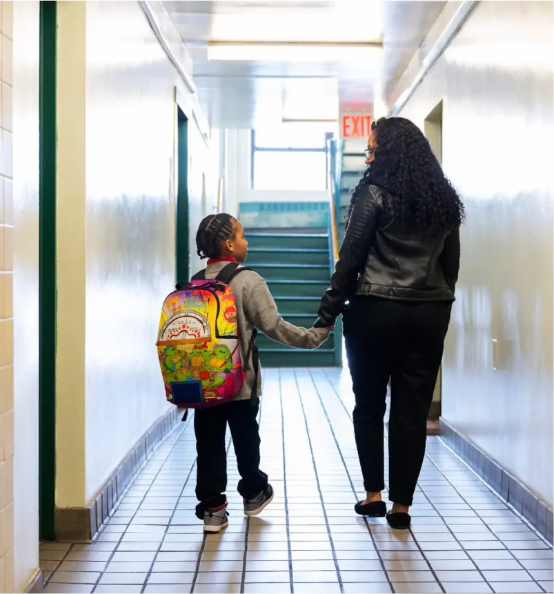 Angelica and Craig in the school hallway